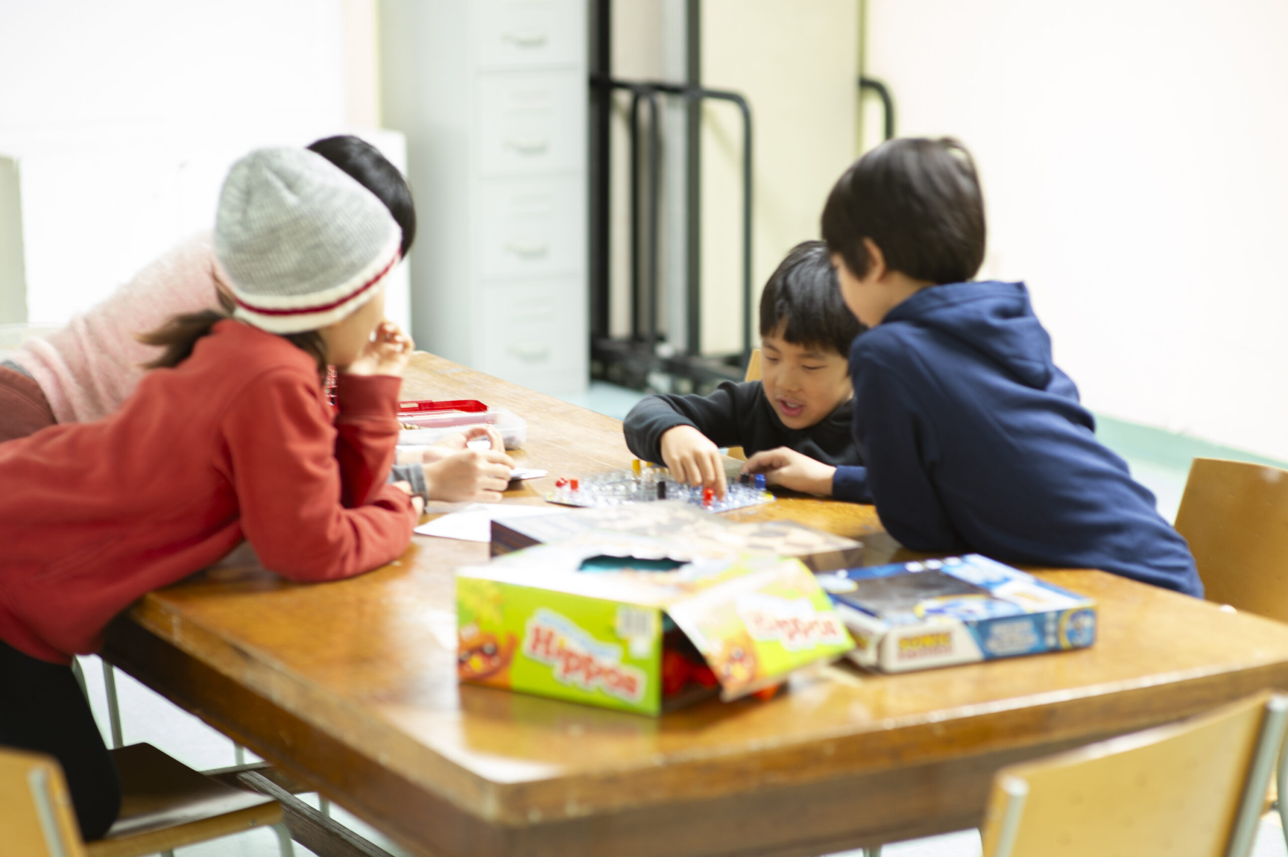 kids playing around a table
