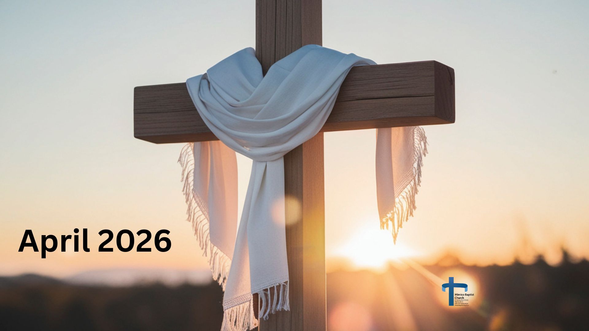 Cross with white shawl in front of sunrise