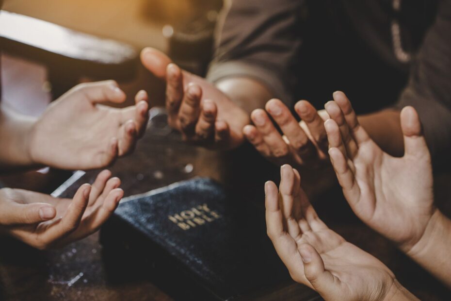 3 pairs of hands praying together